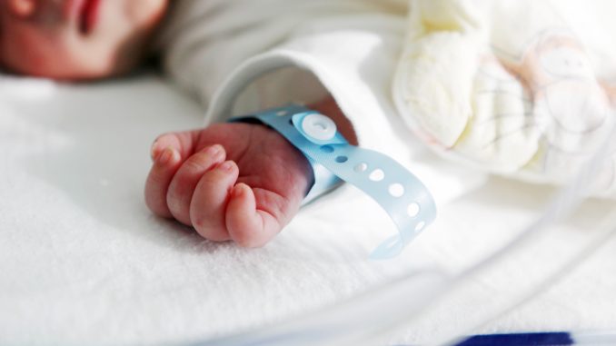 newborn baby in incubator premature birth complications