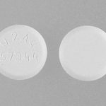 m2a4 over 57344 white oblong pill